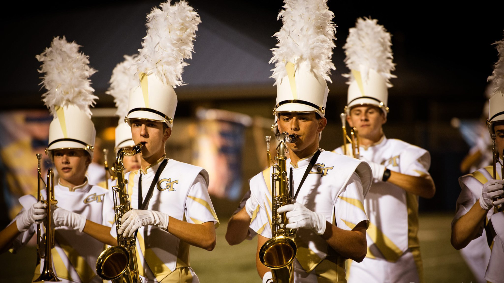 Members of the band playing saxophone.