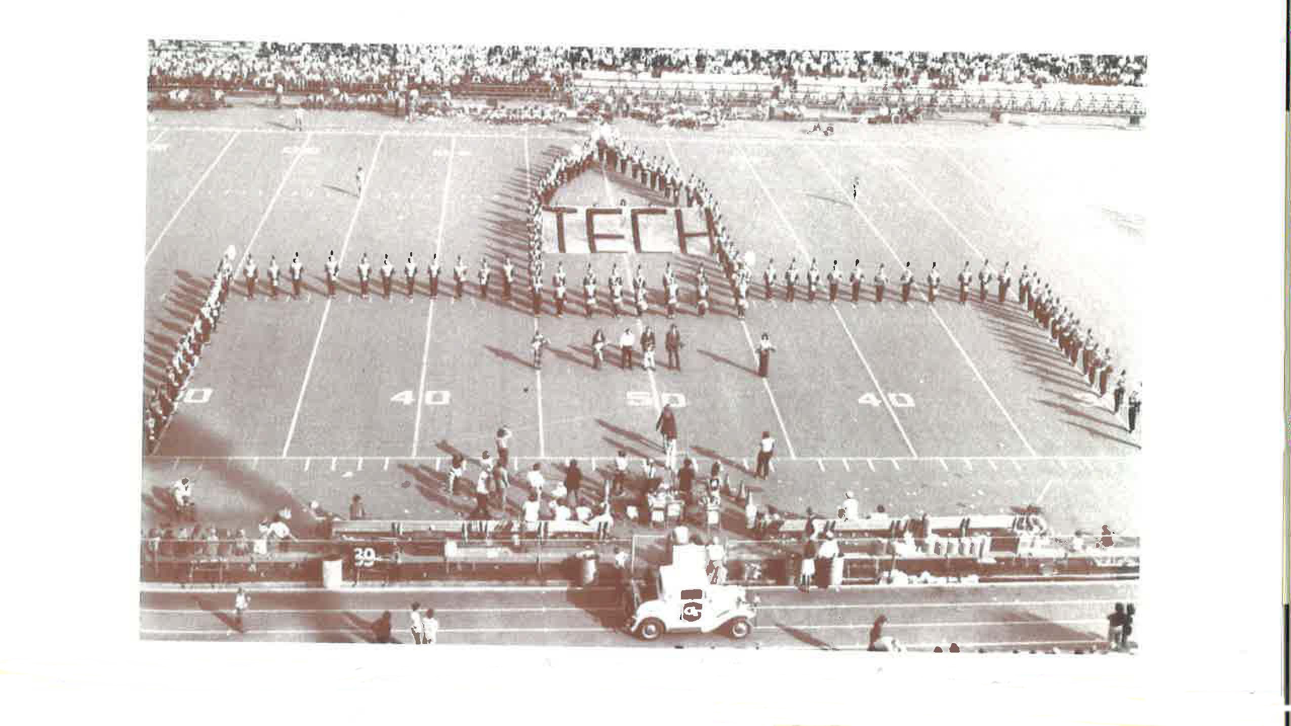 A shot of the Marching Band on the field of Bobby Dodd stadium in the 1970s.