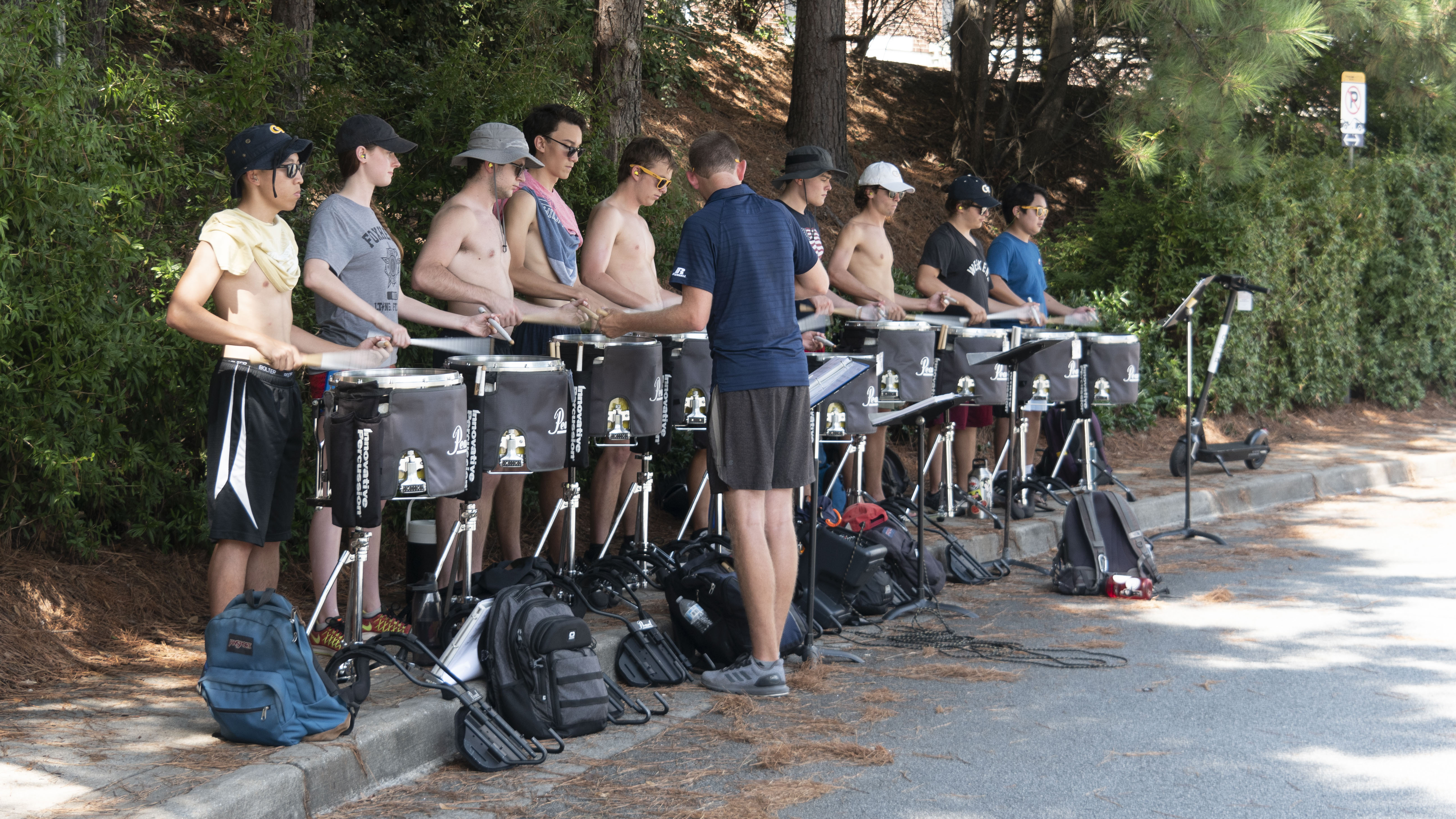 Members of the drumline practicing at camp.