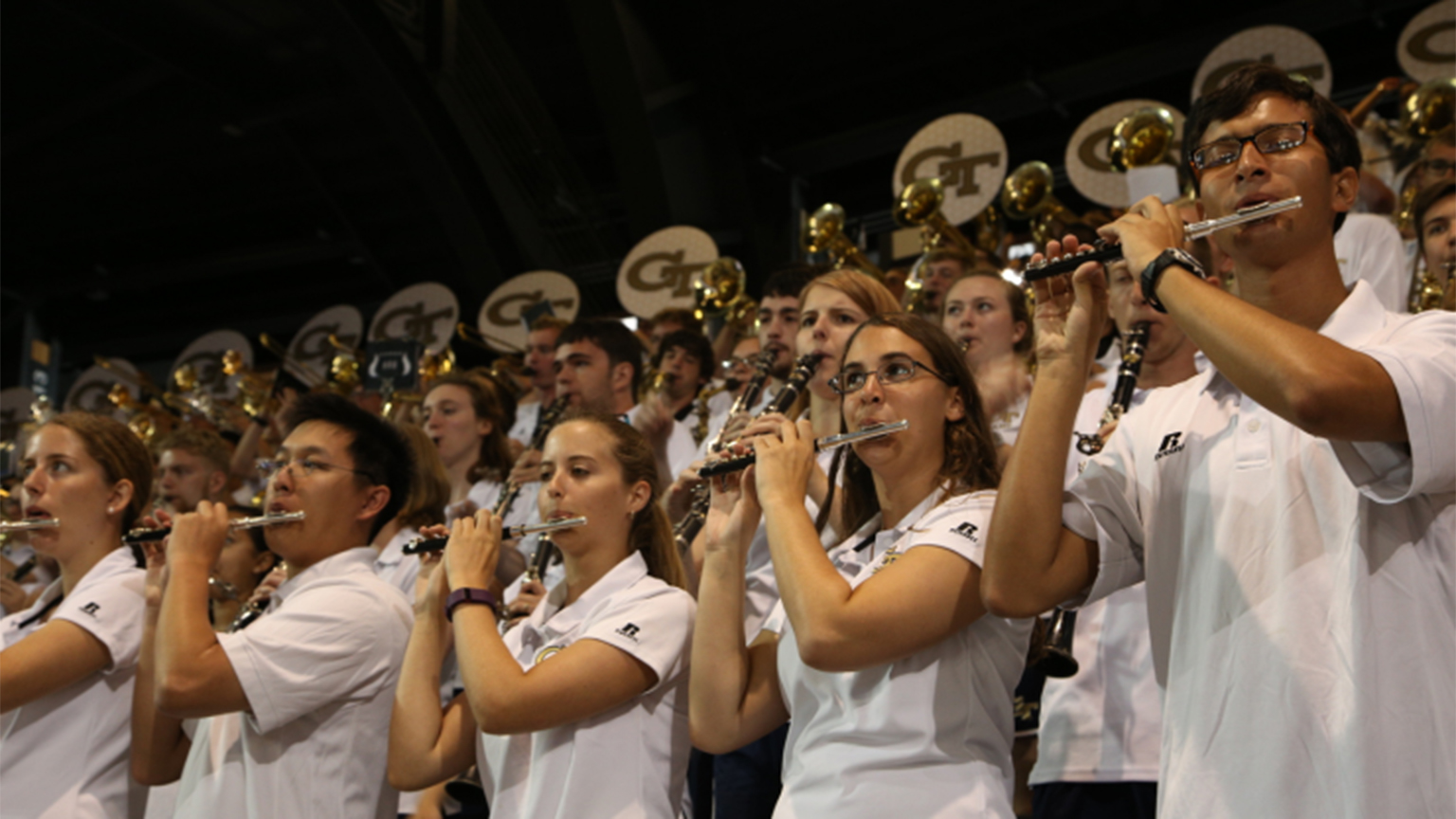 Members of the Pep Band performing at a game.
