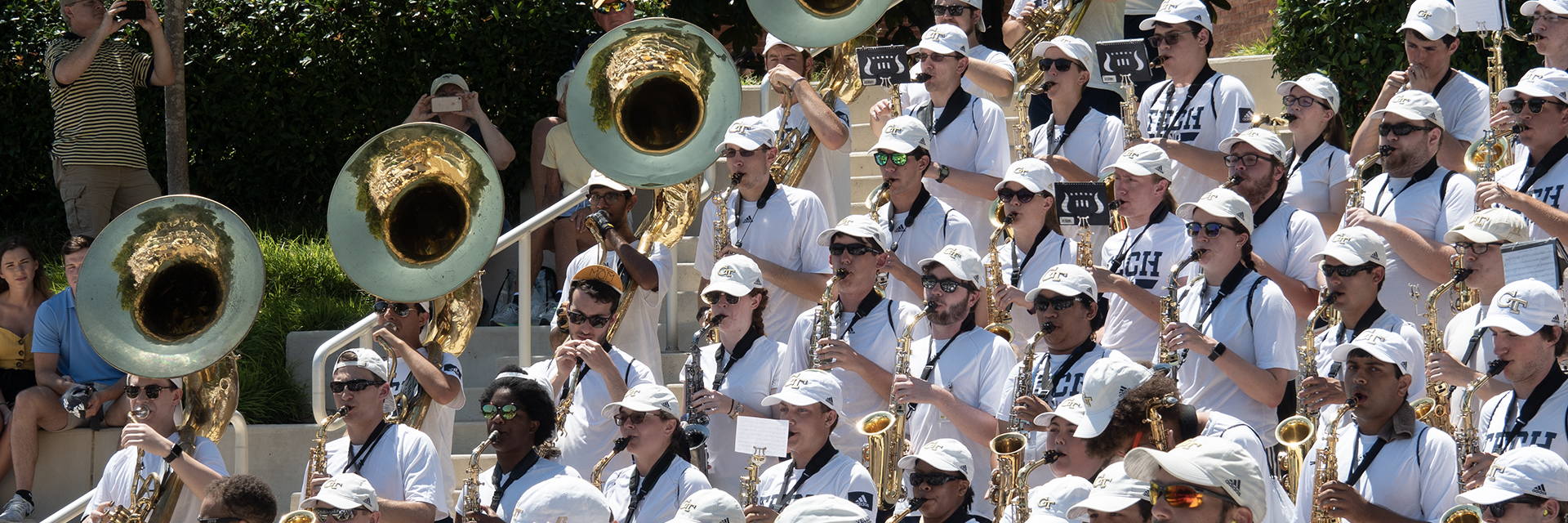 A group view of the marching band performing. 